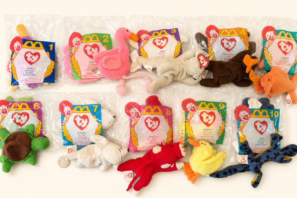 Ten 1997 McDonald's Teenie Beanie Babies still sealed in their numbered Happy Meal bags