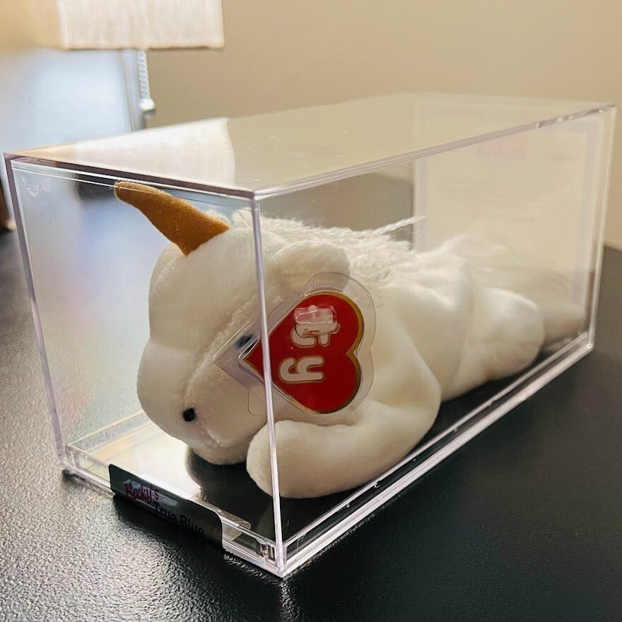 Fine-mane Mystic the unicorn Beanie Baby with a tan horn, in a display case