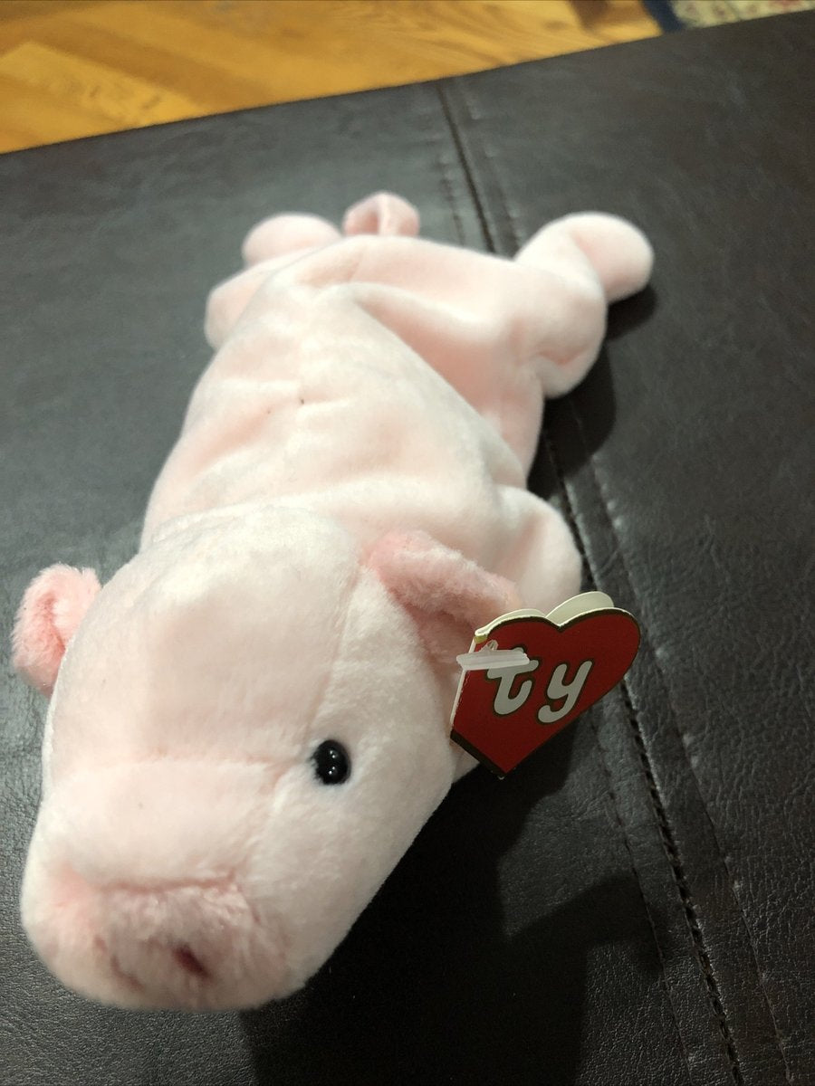 Pink Squealer the pig Beanie Baby with its hang tag